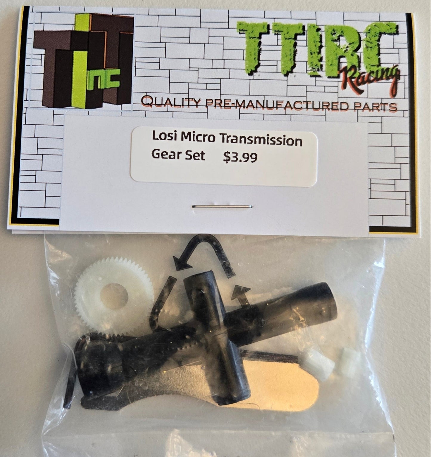 Packaged micro transmission gear set with TTIRC Racing label on a white background