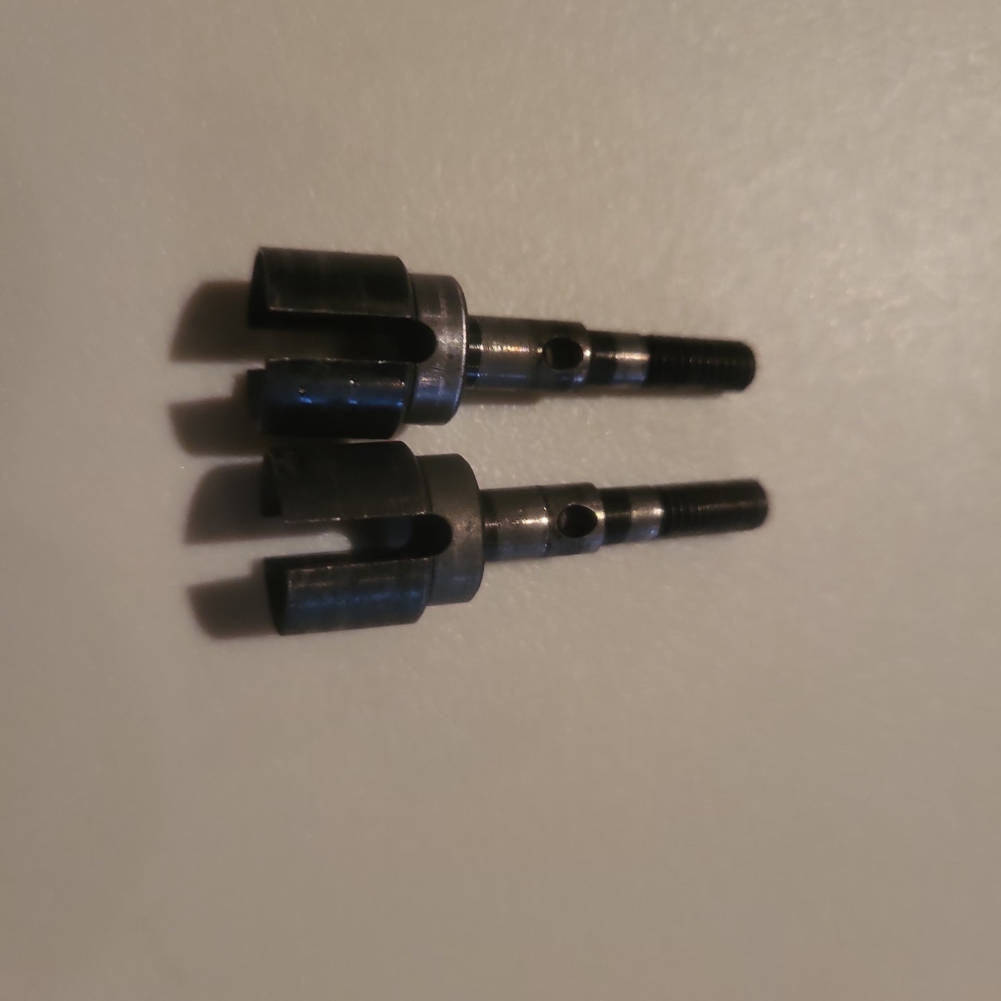 Axial drive cup axle set